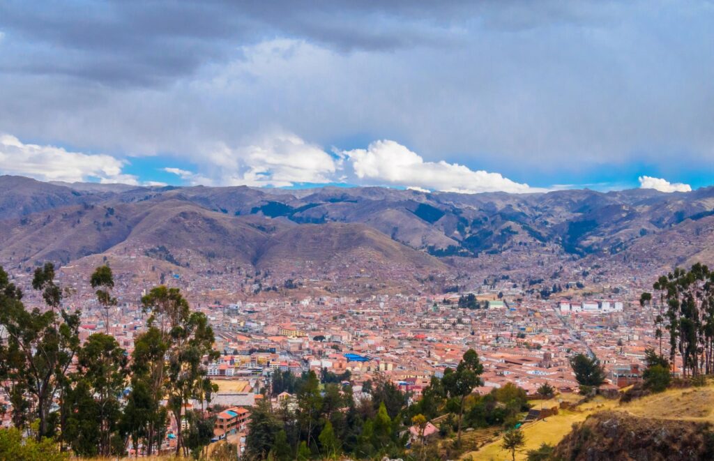 The city of Cusco in Peru viewed from the Pukapukara incan site, horizontal extreme wide shot